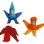 Drei Purzelzwerge in gelb, rot und blau